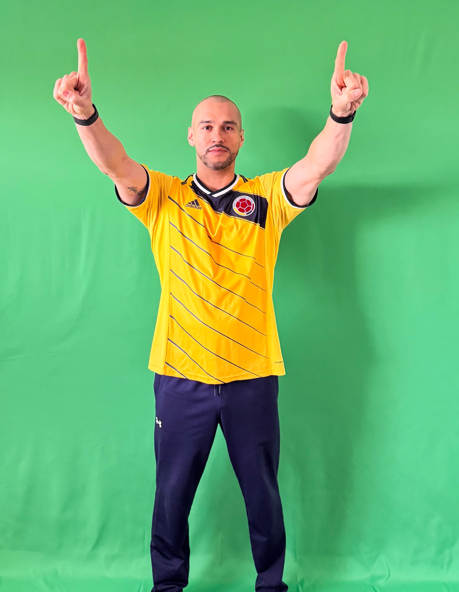 Before: subject photographed on green screen in Colombia jersey