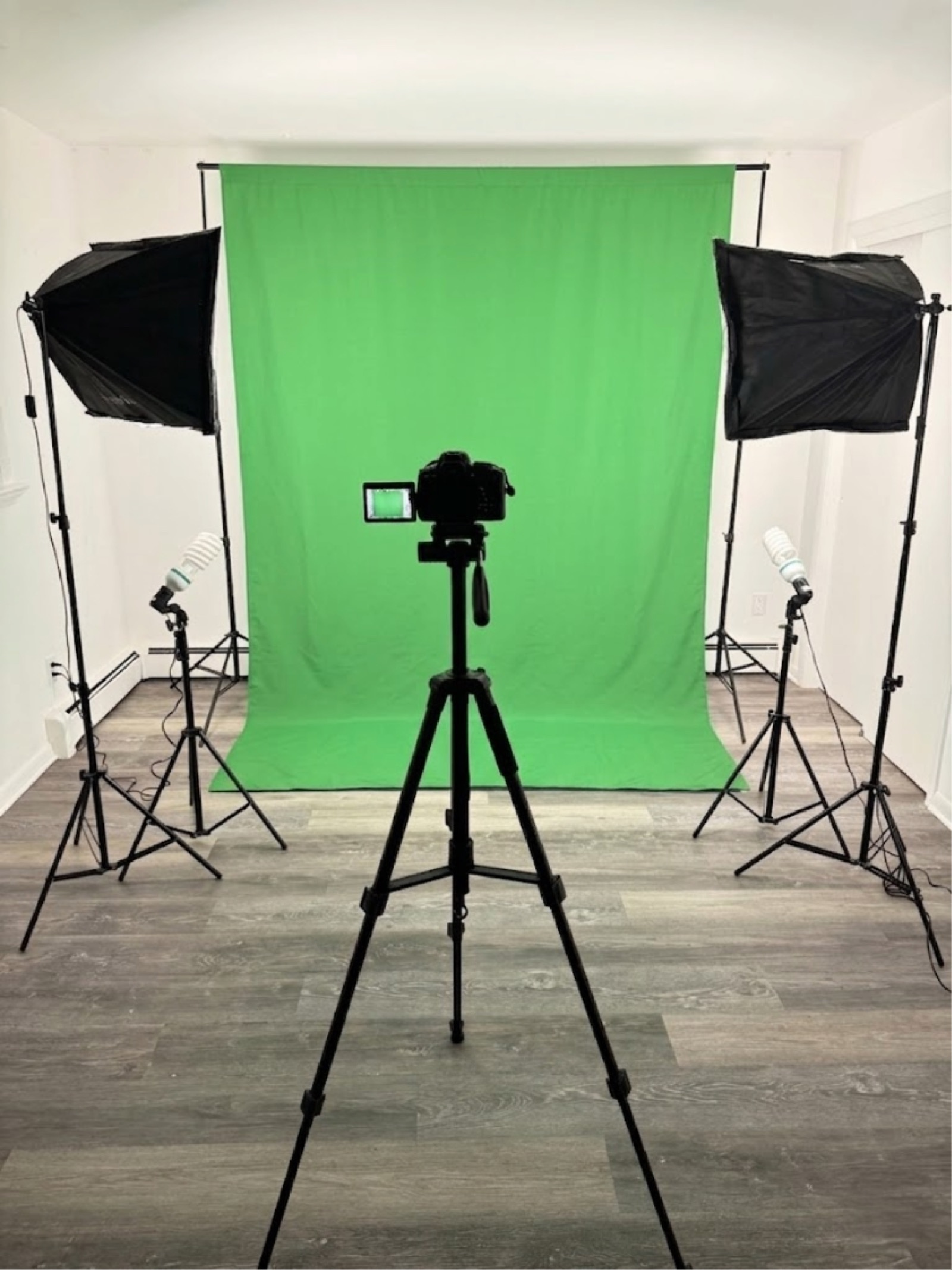 Studio setup with green screen for custom backgrounds